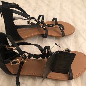 Black and gold sandals